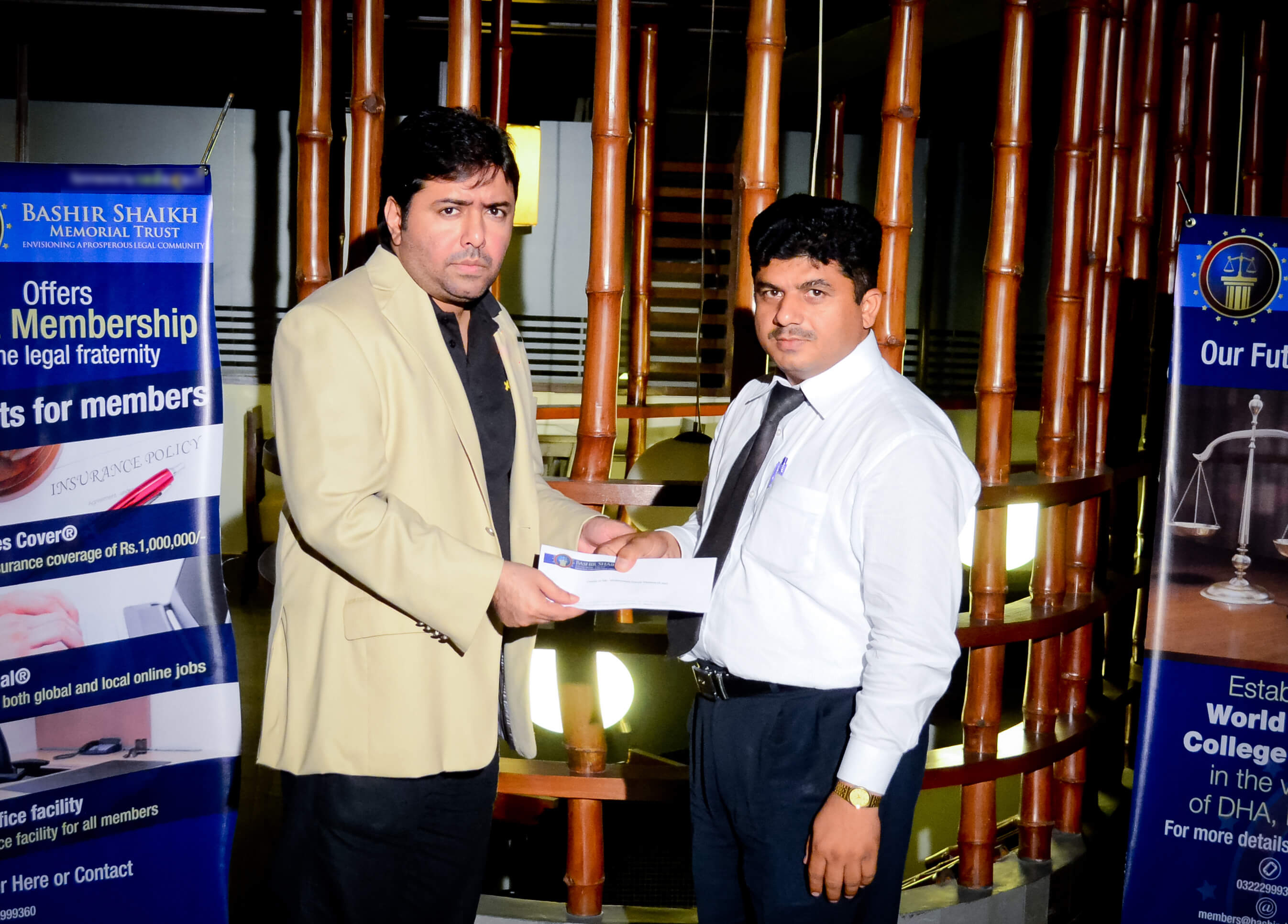 Mr.Shoaib Ahmed Shaikh, Chairman, BSMT, presenting a cheque to the family member of the deceased member.